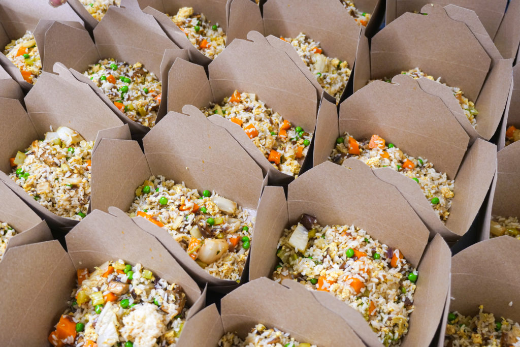 Boxes of fried rice prepared by Patchwork Nashville chefs